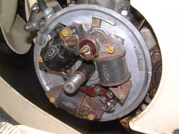 Flywheel removed showing the coils and condenser/capacitor