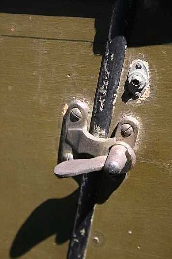 Sidecar door latch