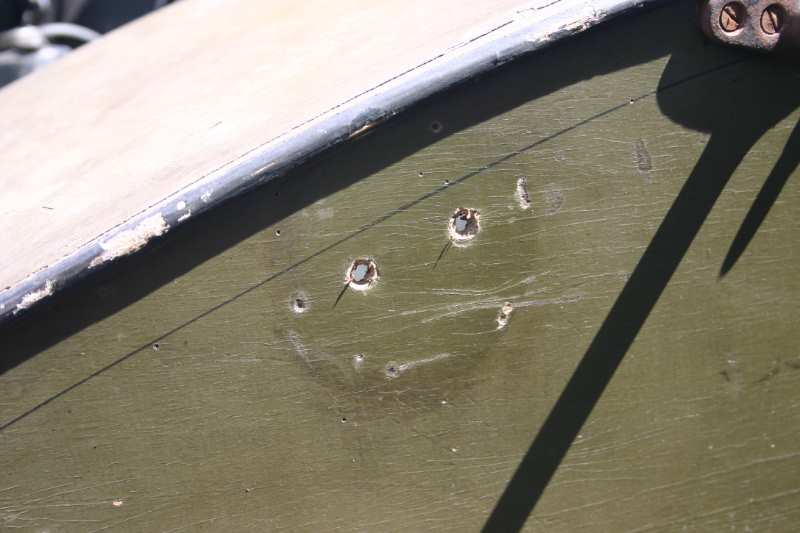 The holes for the missing tax disc holder