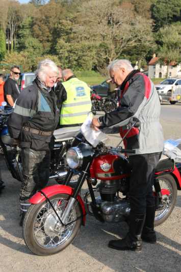 Mervyn Panting watching Tony Brinsden fettling his route holder